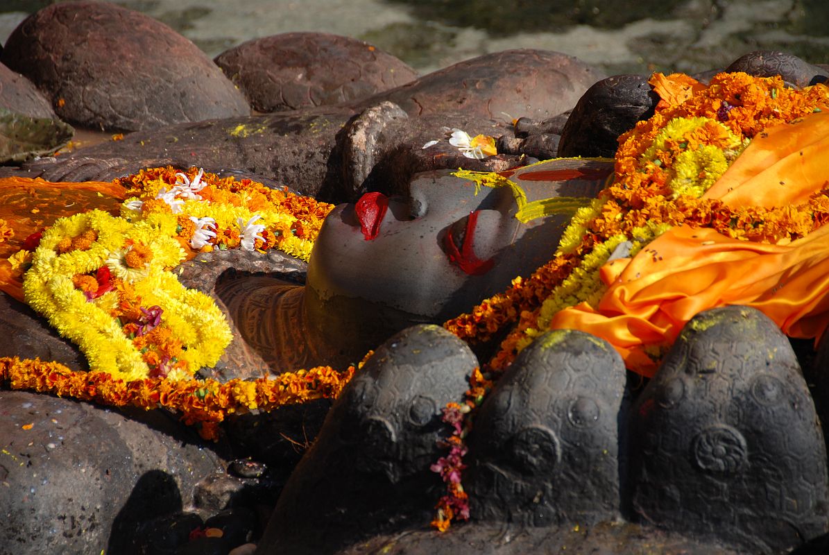 Kathmandu Valley 1 Budhanikantha 2 Sleeping Vishnu Head Close Up The 5m long image Budhanilkantha Narayan (Sleeping Vishnu) was created in the 7th or 8th century from one monolithic piece of stone and is the most impressive, if not the most important, Vishnu shrine in Nepal.